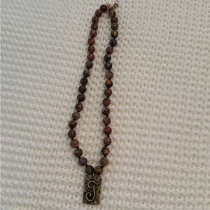 Elegant Beaded Necklace with Pendant